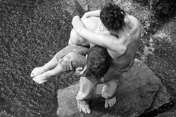 photo of intertwined male and female dancers