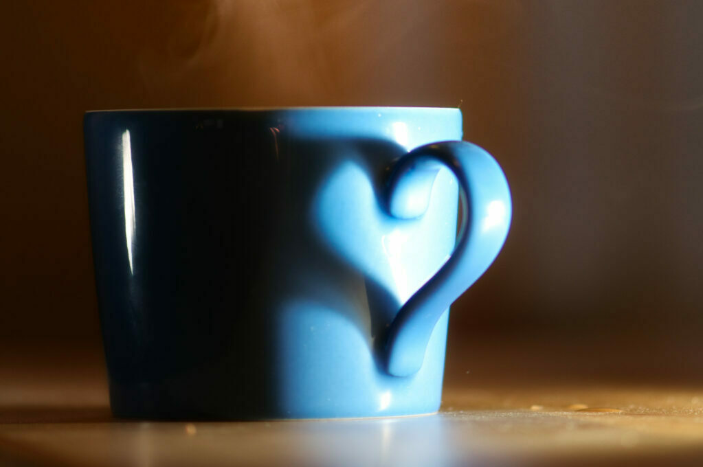 photo of a mug with steaming beverage