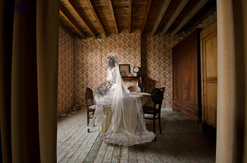 photo of bride dressed in old-fashioned wedding dress